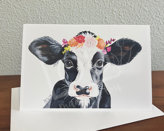 Baby cow with a botanical flower crown
