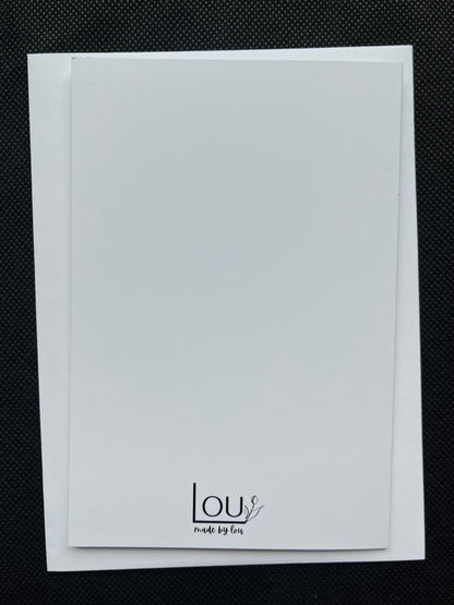 White card with 'LOU' branding on a black textured background